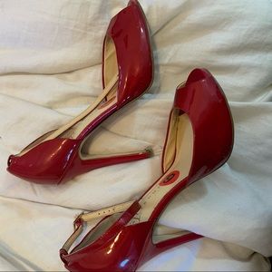 Red open toe heels with ankle strap